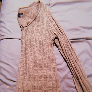 Light brown v-neck sweater